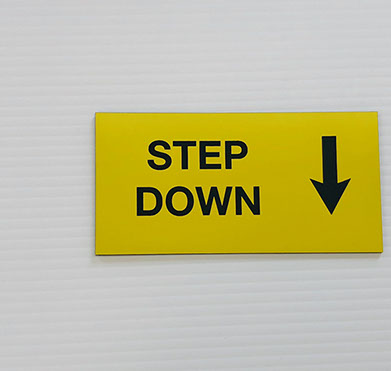 Yellow acrylic piece with black engraved