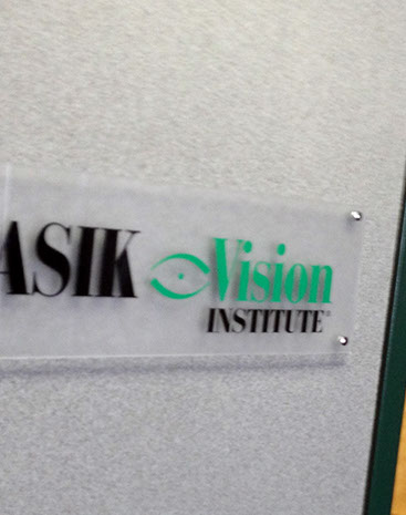 Cut Vinyl on acrylic sign mounted with stand offs